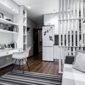 Zoning of the kitchen-living room with a light partition