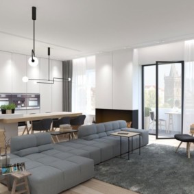 Canapé gris avec oreillers moelleux