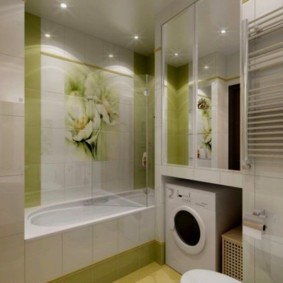 Một máy giặt trong hốc phòng tắm