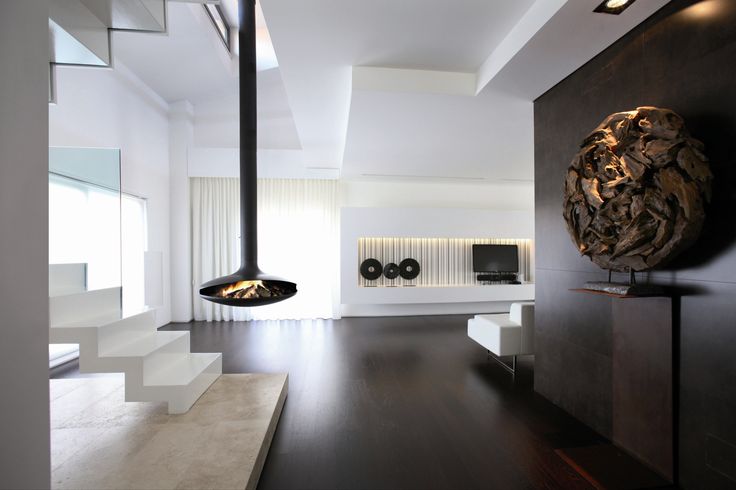 Living minimalist cu vatră insulară