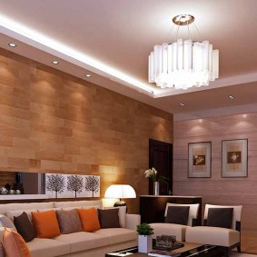 ตกแต่งผนังห้องนั่งเล่นด้วยการกรุไม้