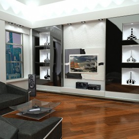 Meubles noirs sur un plancher en bois