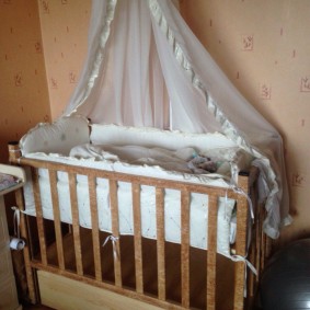 Canopy of light fabric over the crib