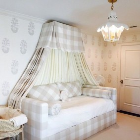 Checkered canopy over a children's sofa