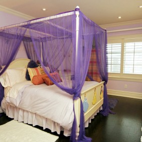 Lilac canopy over a teenager's bed
