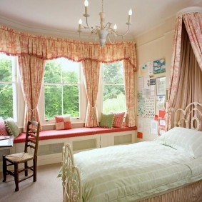 Sofa in the bay window of a children's bedroom