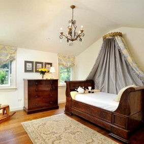 Wooden furniture in the interior of the children's bedroom