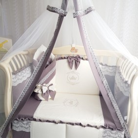 Crib for a baby with quality textiles