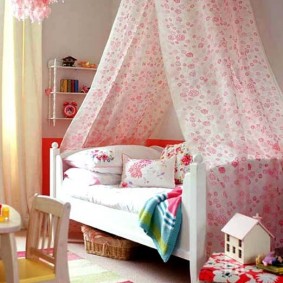 Striped rug in front of daughter's bed