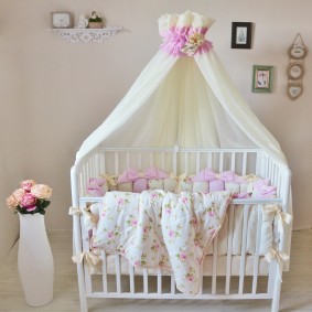 Baby blanket on a wooden crib