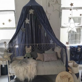 Small pillows on a newborn's crib