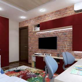 TV su un muro di mattoni nella stanza dei bambini