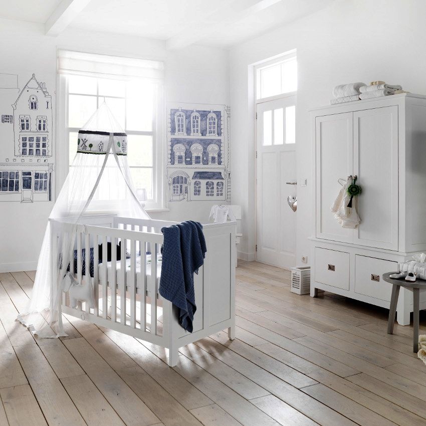 Aerial fabric canopy on the crib