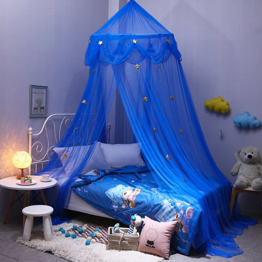 Blue canopy over the boy's bed