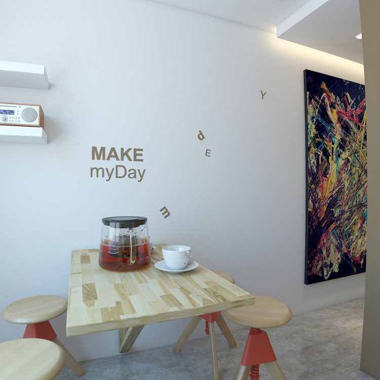 Beyaz bir duvar önünde mutfak masası