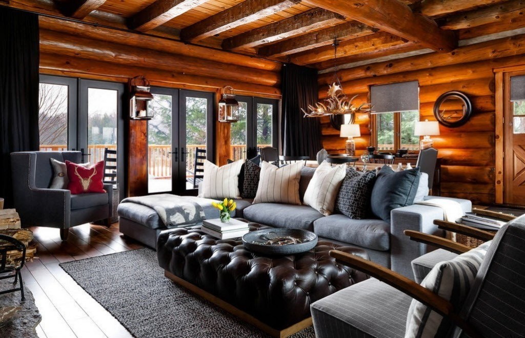 Dark furniture in the house of thick logs