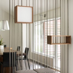 Compartimentare decorativă din tuburi metalice