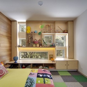 Built-in wardrobes in the window of the children's room