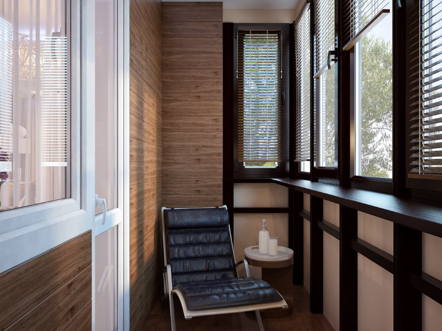 Kleine fauteuil in het interieur van een glazen balkon