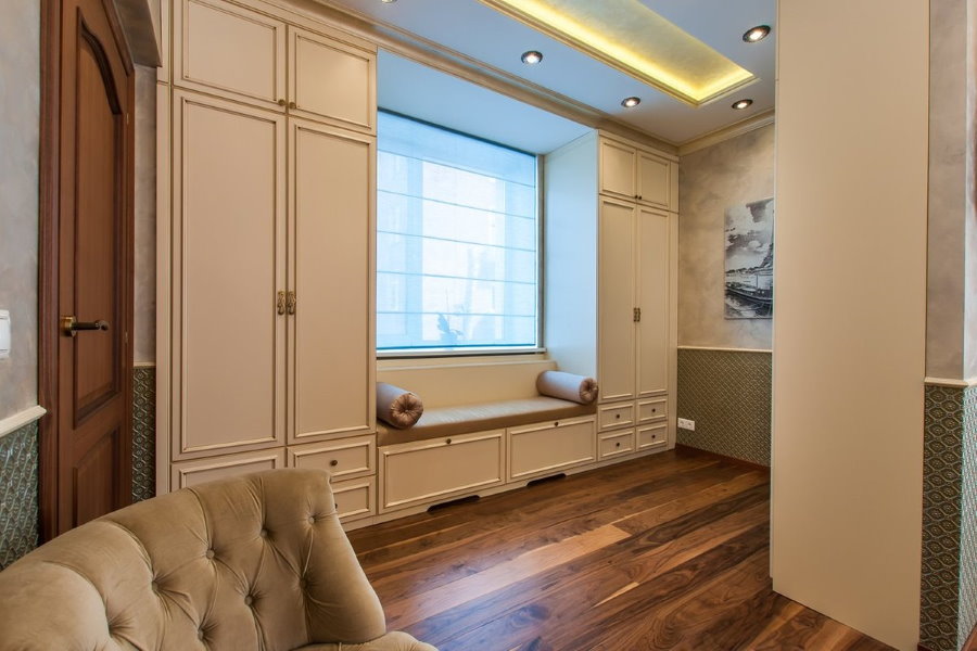 Wardrobes around the bedroom window