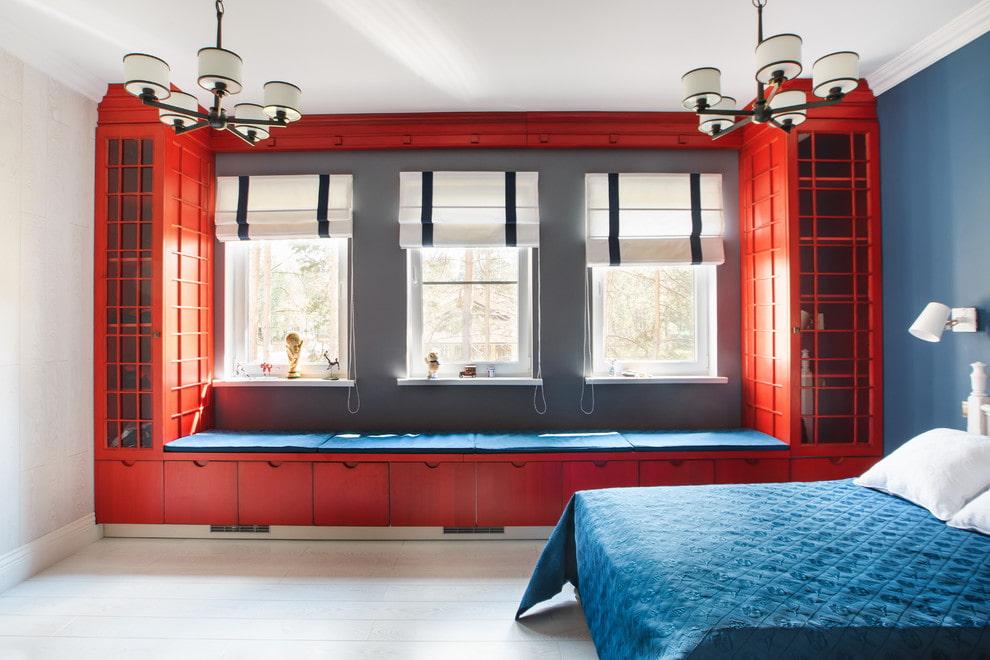Red lockers around a bedroom window